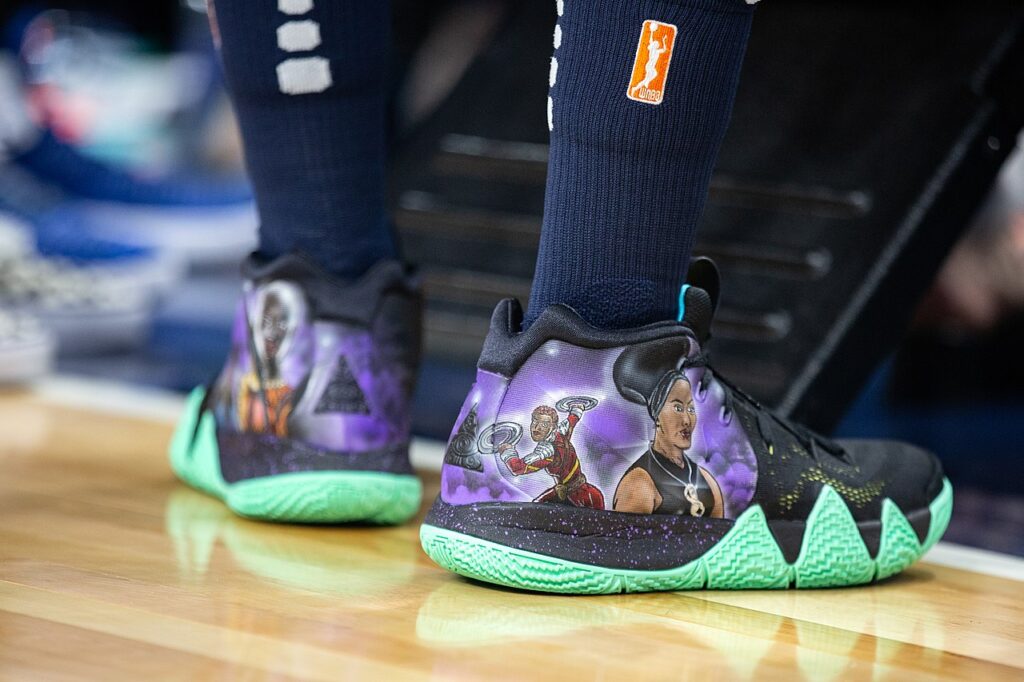 Custom hand-painted sneakers with detailed character artwork